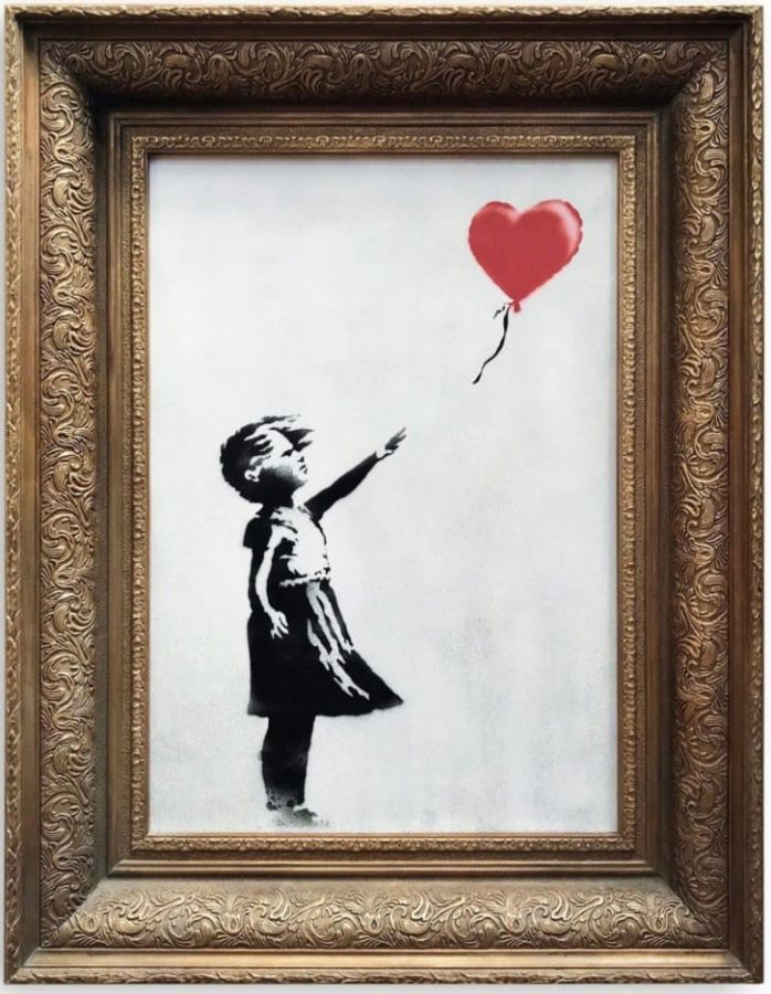 # 震驚全世界：神秘英國藝術家 Banksy 於拍賣會成交後自毀畫作 'Girl With a Balloon' 1